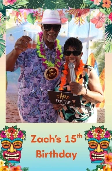 Friends celebrating at Zach’s luau birthday photo booth
