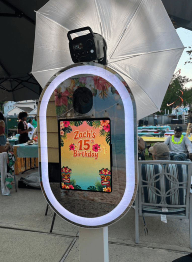 Nova Premium DSLR Photo Booth with studio umbrella at a birthday celebration